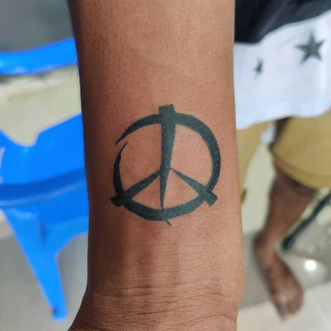 tattoo simbolo paz 107