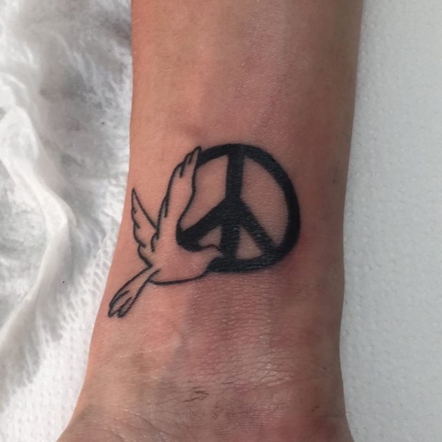 tattoo simbolo paz 133