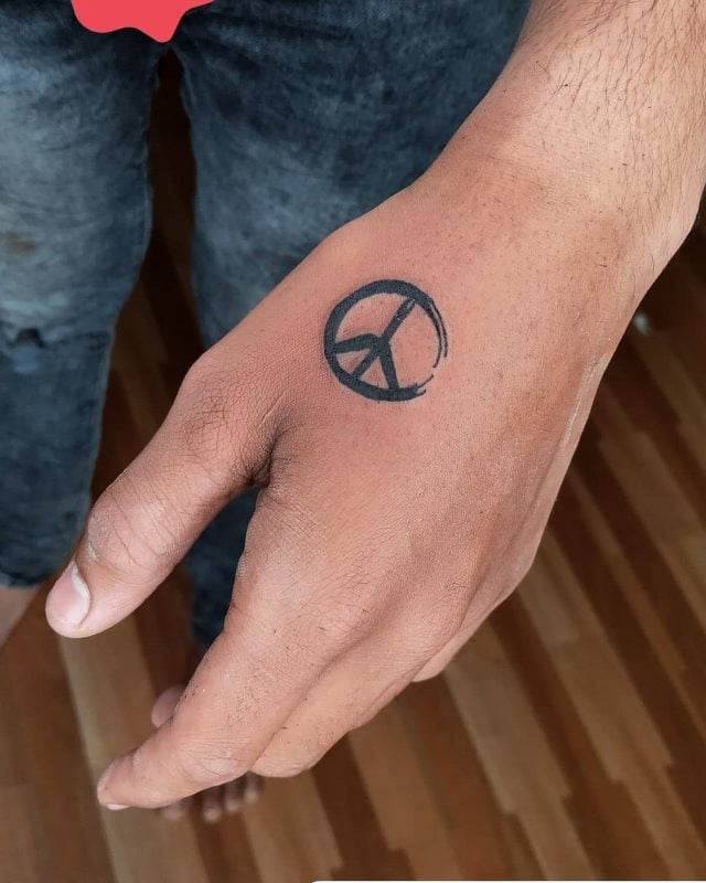 tattoo simbolo paz 53