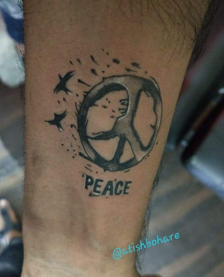 tattoo simbolo paz 55