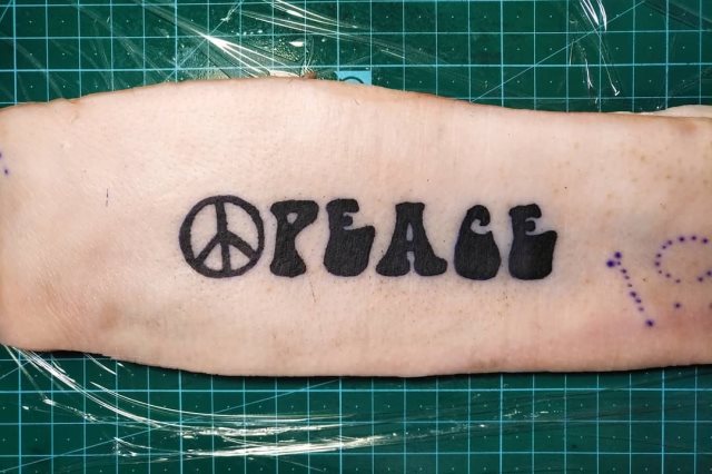 tattoo simbolo paz 61