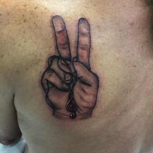 tattoo simbolo paz 69