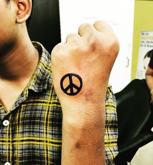 tattoo simbolo paz 73