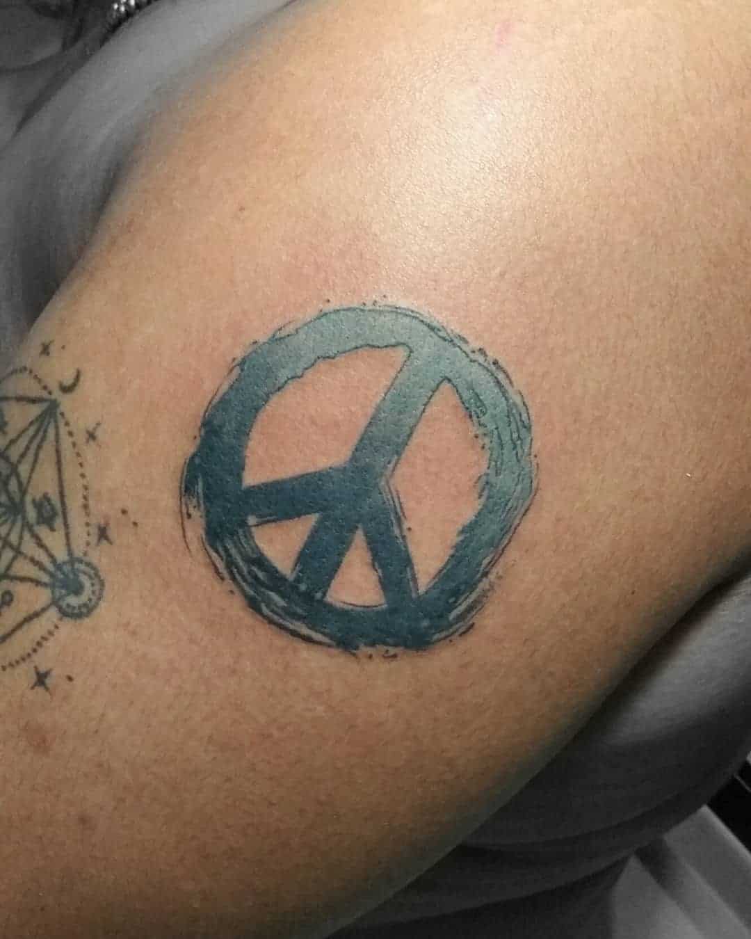 tattoo simbolo paz 96