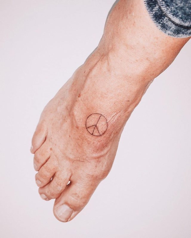 tattoo simbolo paz 99