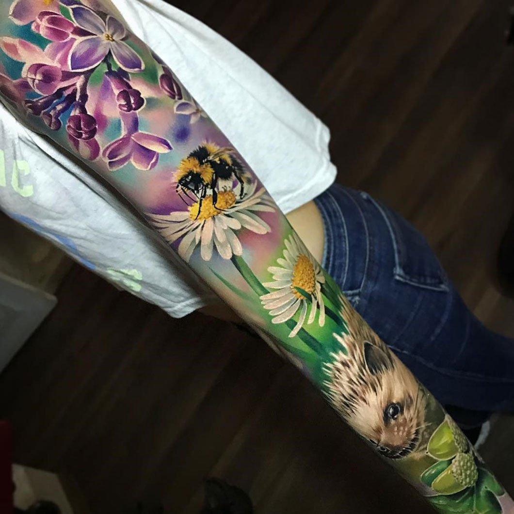 tatuaje brazo completo para mujer 16