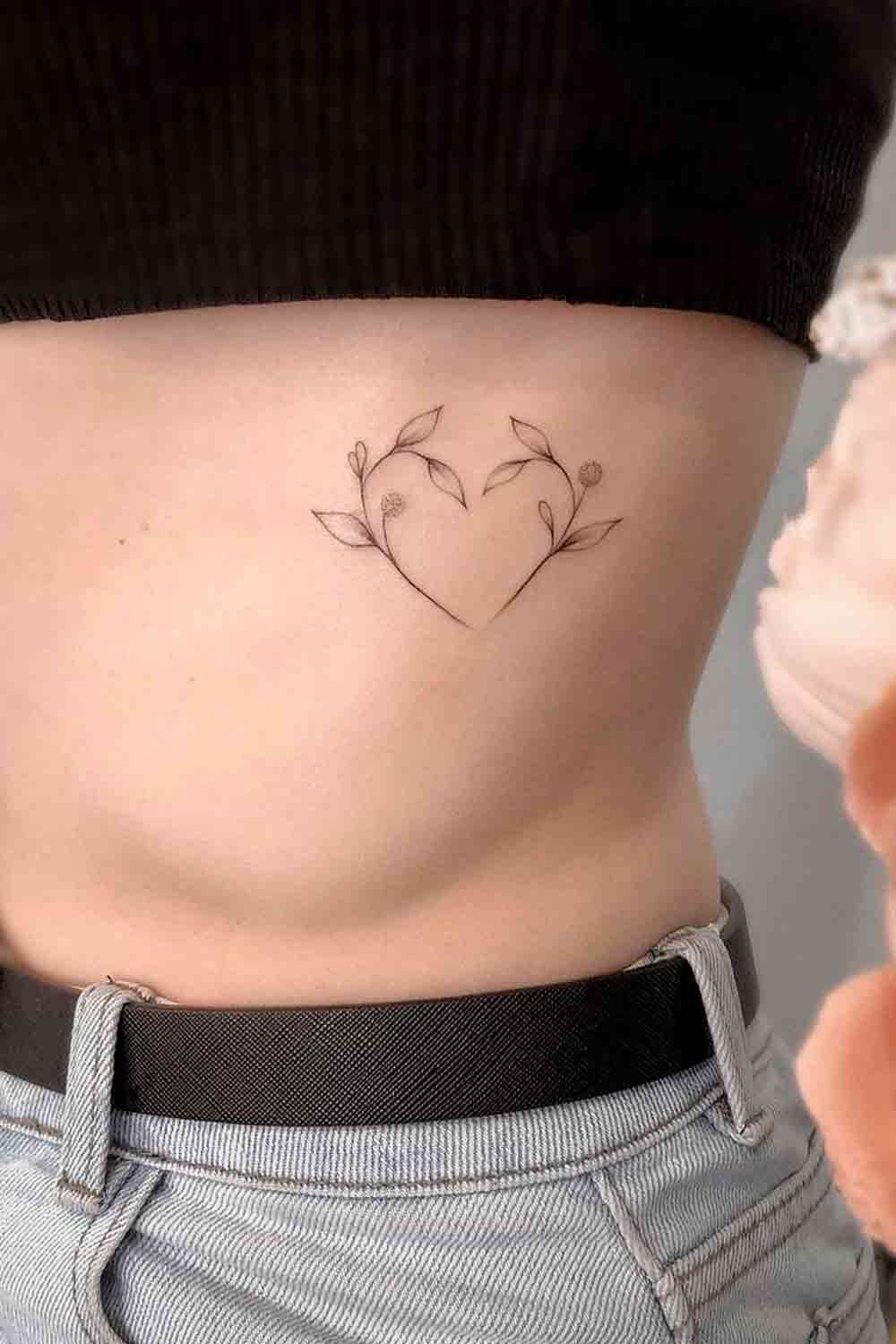 tatuaje costado para mujer 25