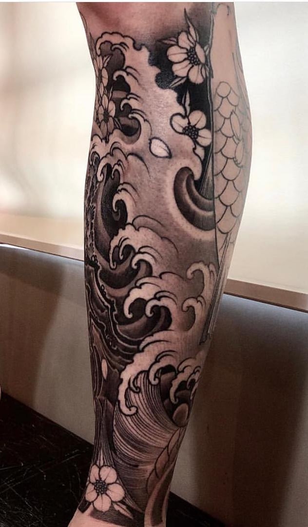 tatuaje de hombre en la pierna 21