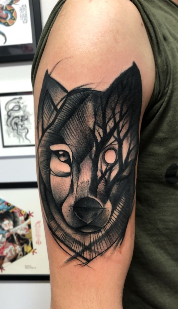tatuaje masculino de lobo 28