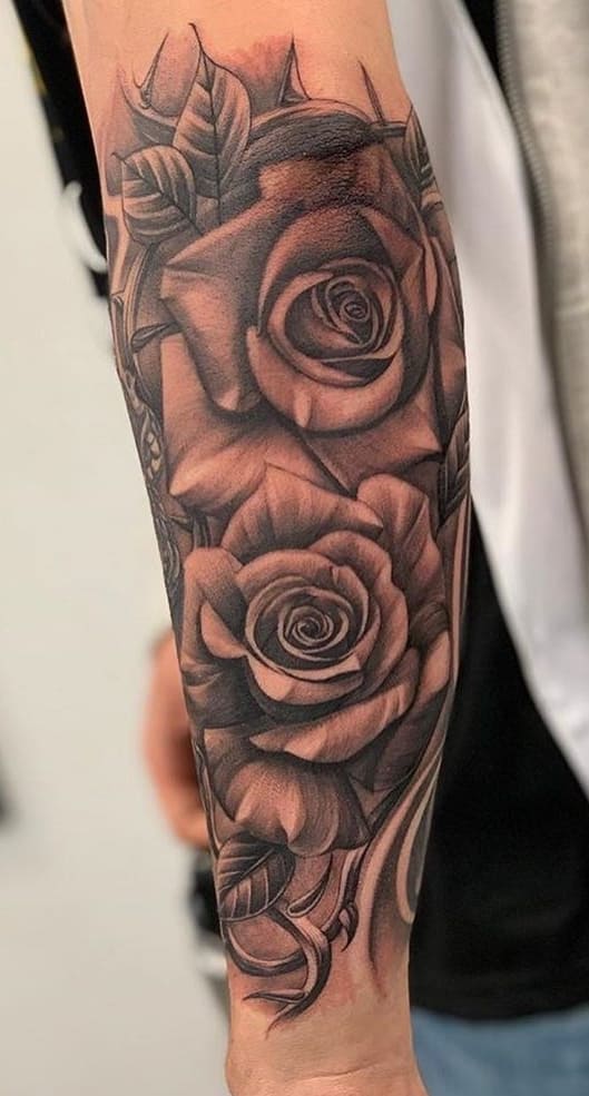 tatuaje masculino en el brazo 158