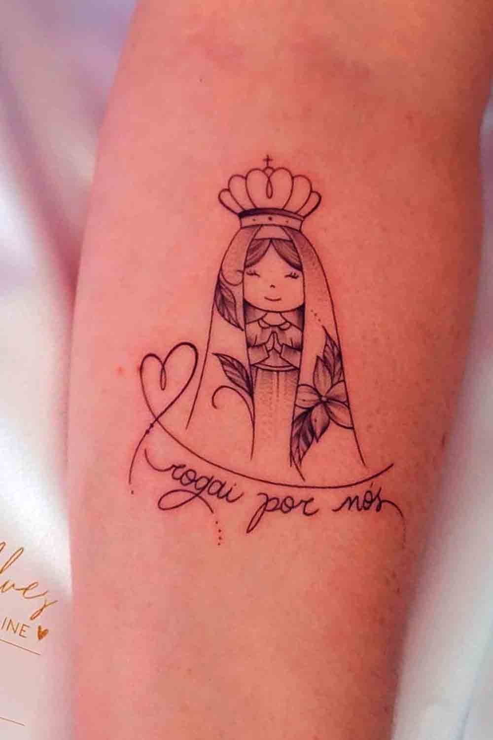 tatuaje religioso de mujer 18