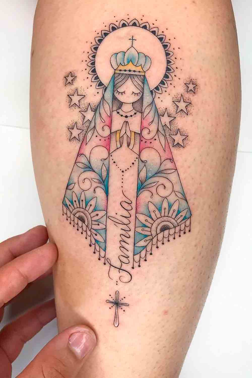 tatuaje religioso de mujer 29
