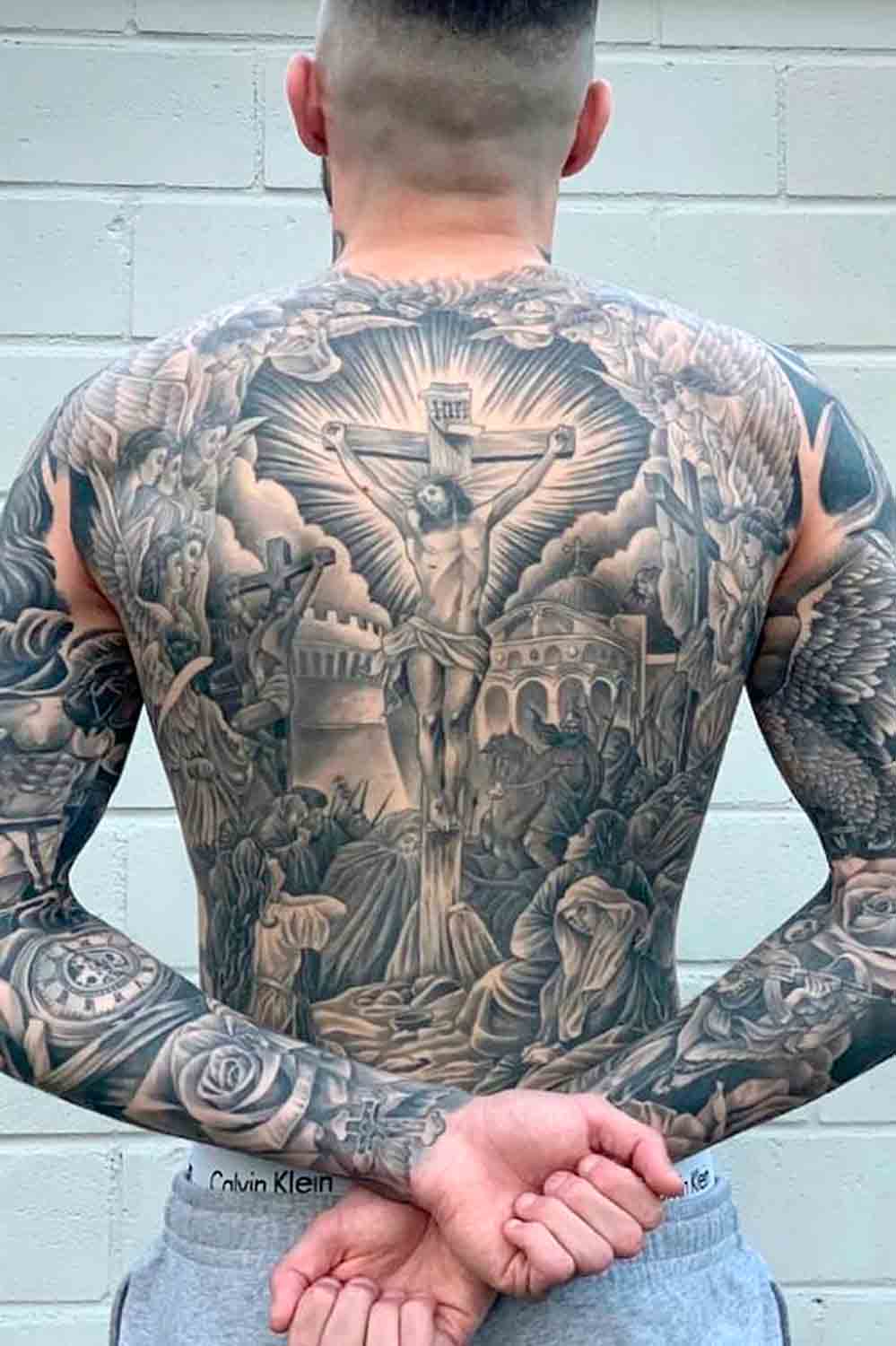 tatuaje religioso para hombre 60