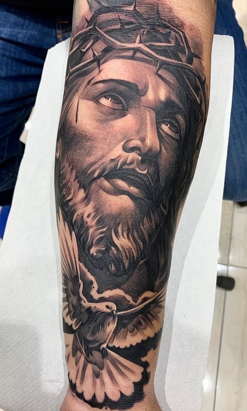 tatuaje religioso para hombre 72