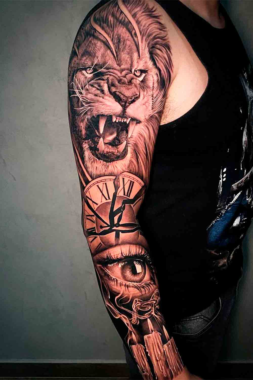 brazo lleno de tatuajes 102