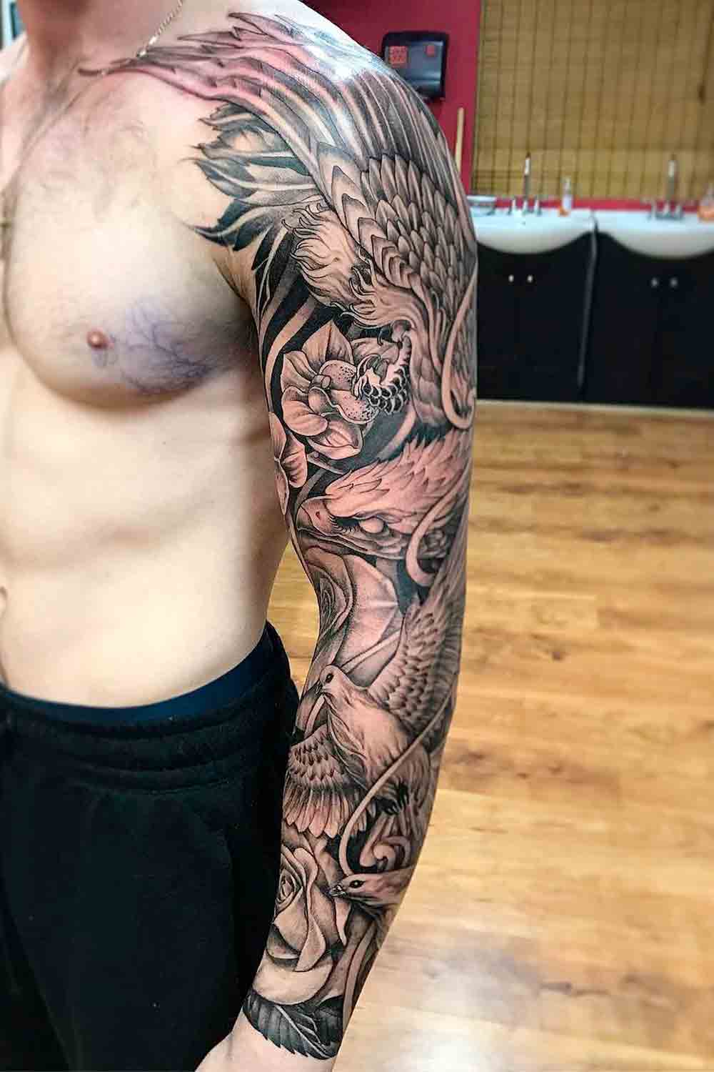 brazo lleno de tatuajes 105