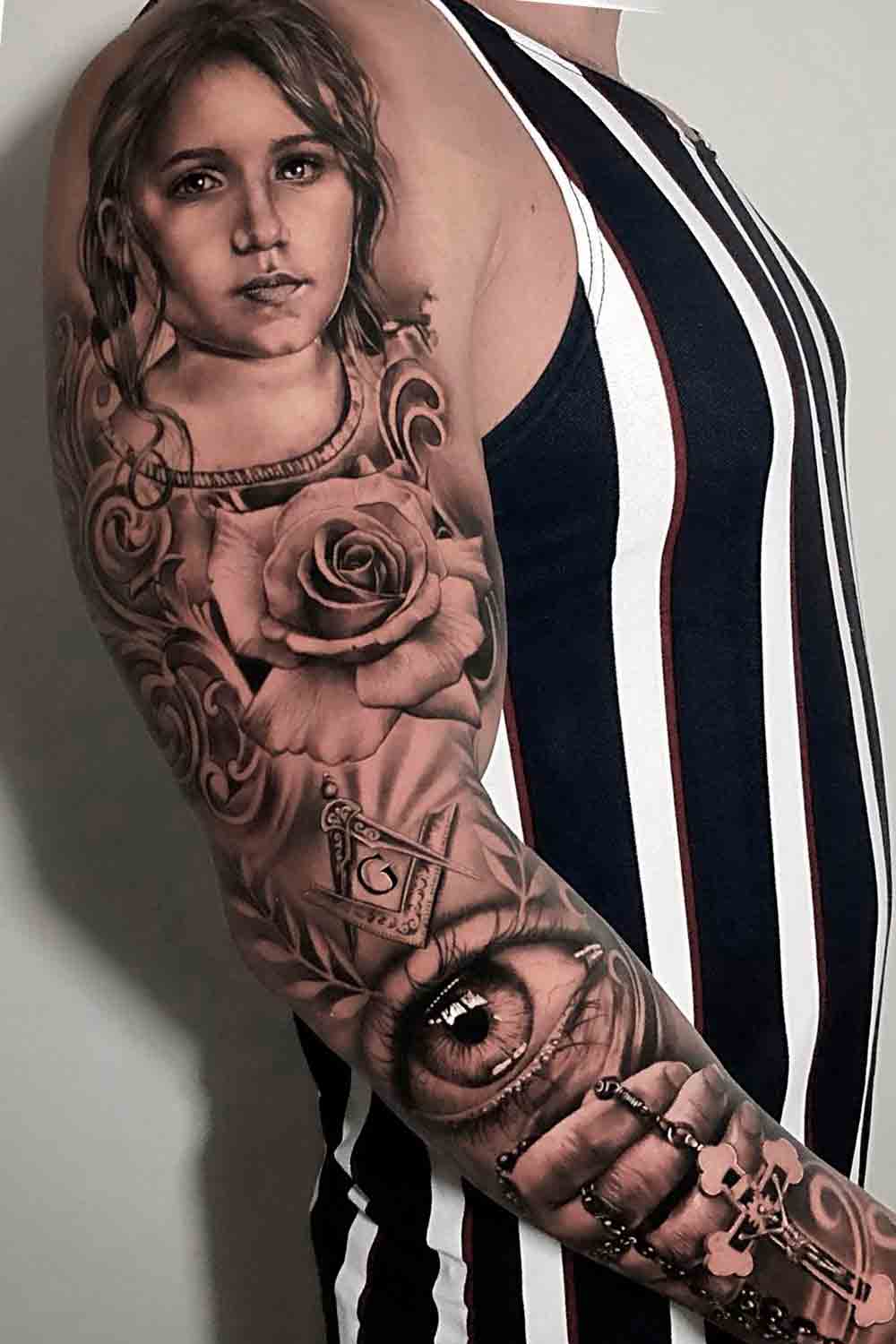 brazo lleno de tatuajes 116