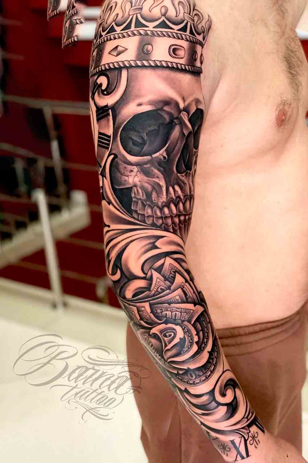 brazo lleno de tatuajes 118