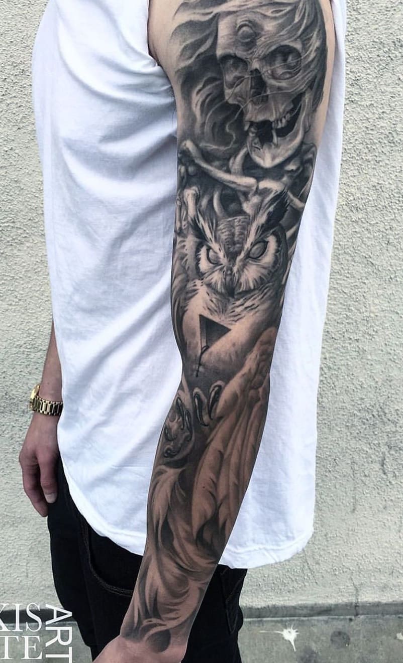 brazo lleno de tatuajes 126