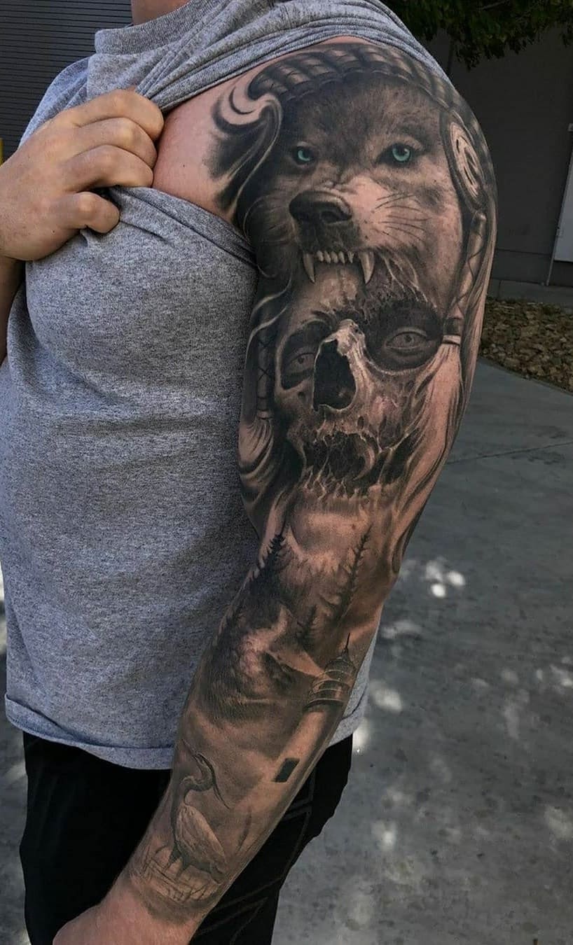 brazo lleno de tatuajes 130