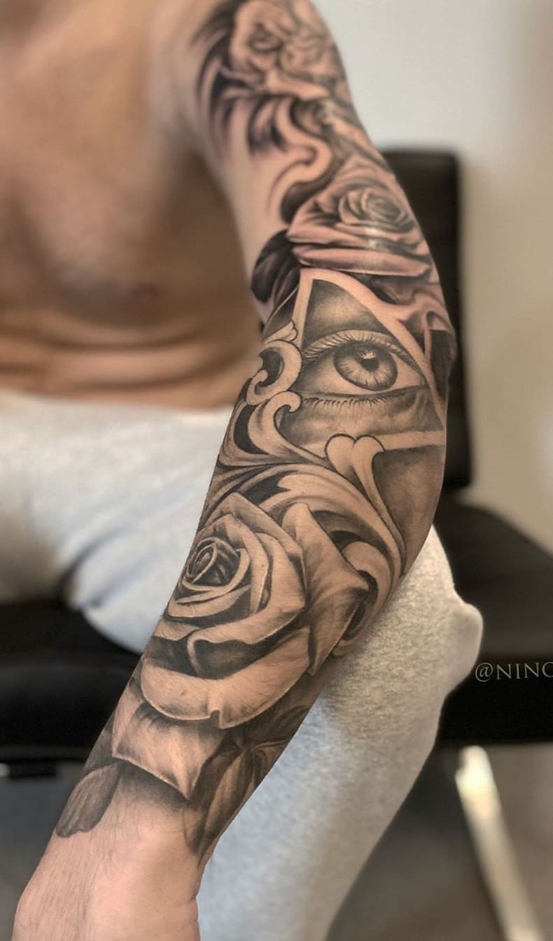 brazo lleno de tatuajes 140