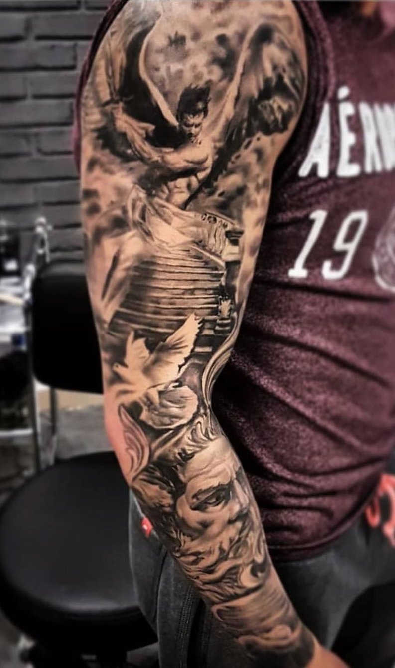 brazo lleno de tatuajes 15