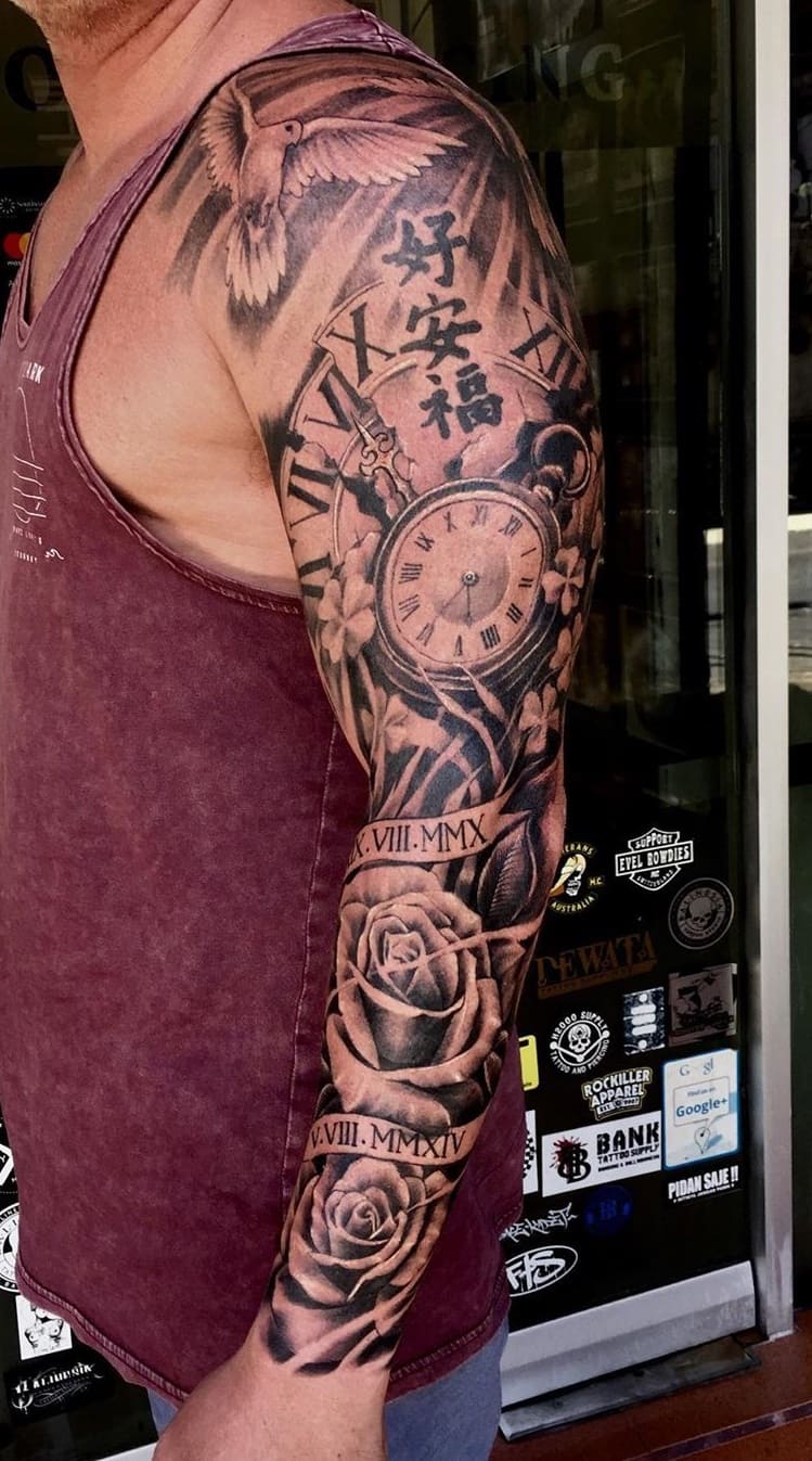 brazo lleno de tatuajes 157