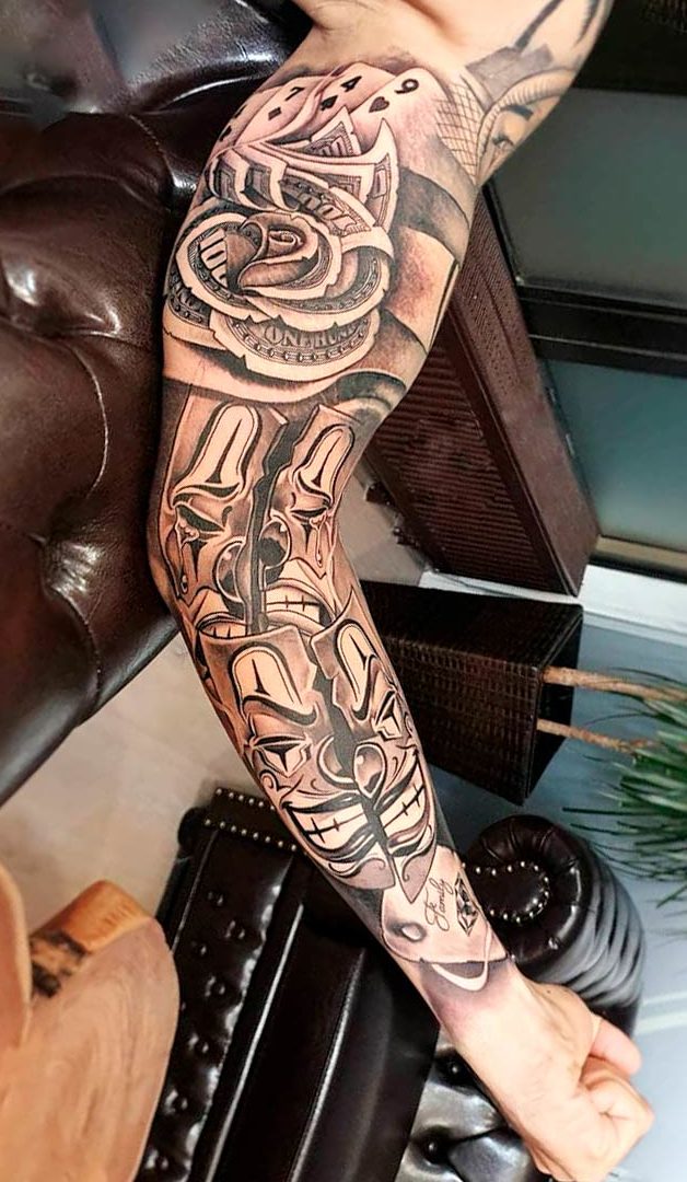 brazo lleno de tatuajes 160