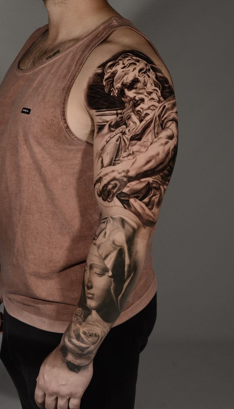 brazo lleno de tatuajes 174
