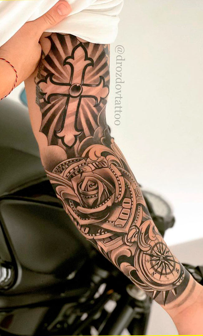 brazo lleno de tatuajes 181