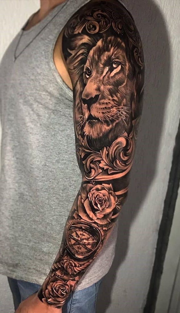 brazo lleno de tatuajes 183