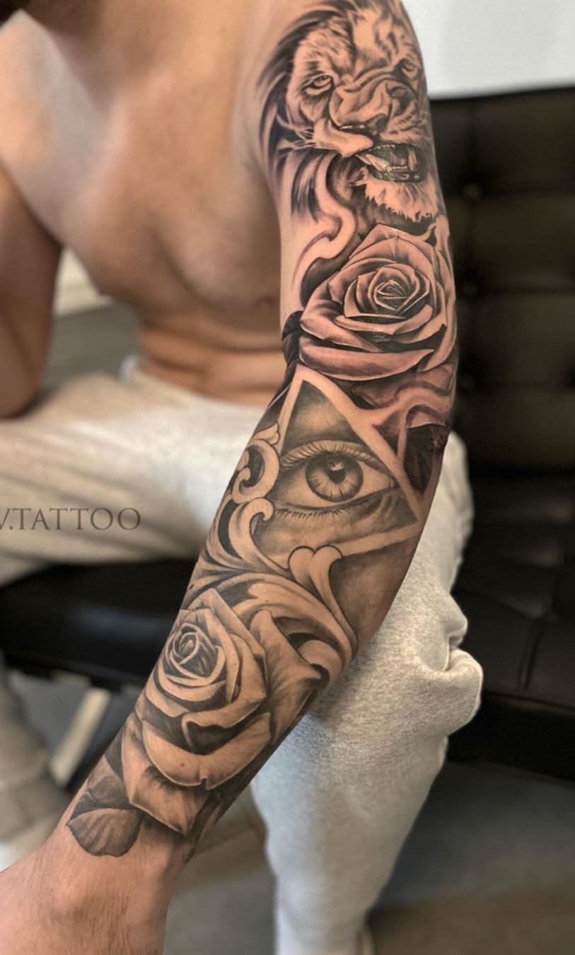 brazo lleno de tatuajes 186