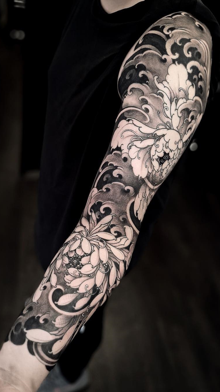brazo lleno de tatuajes 36