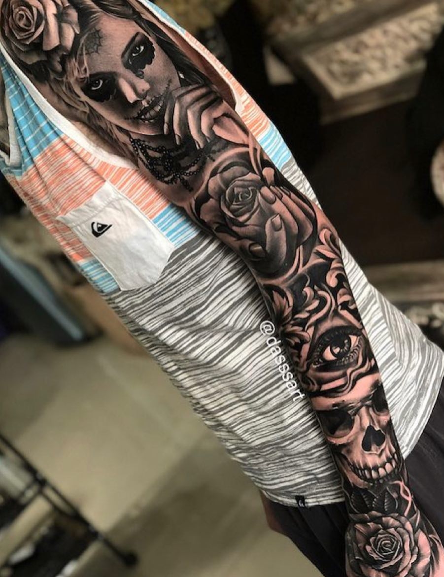 brazo lleno de tatuajes 40