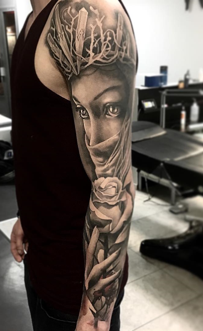 brazo lleno de tatuajes 48