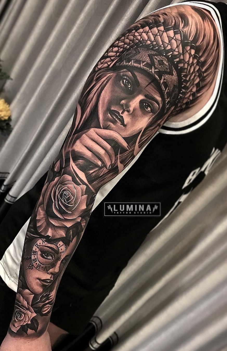 brazo lleno de tatuajes 57