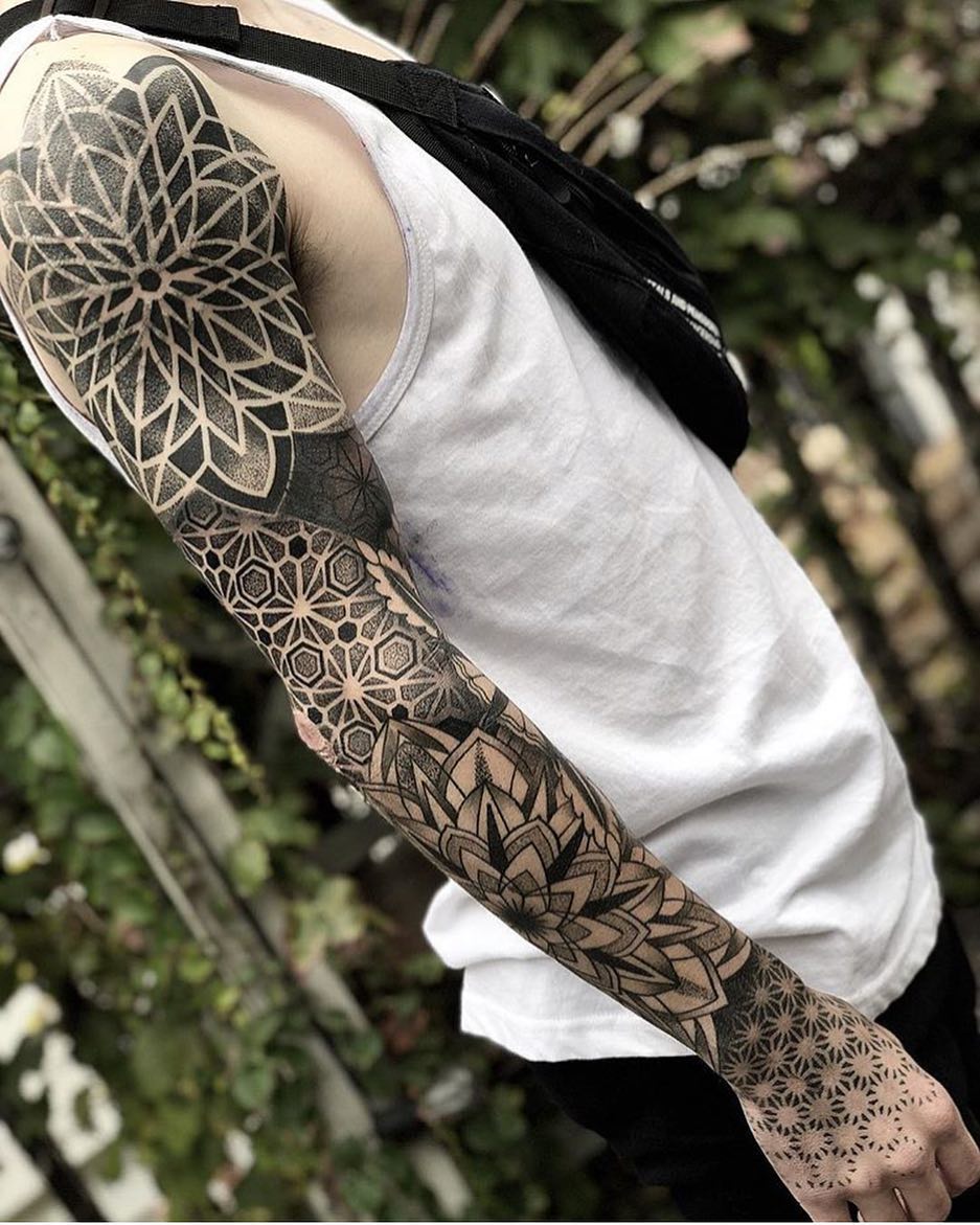 brazo lleno de tatuajes 62