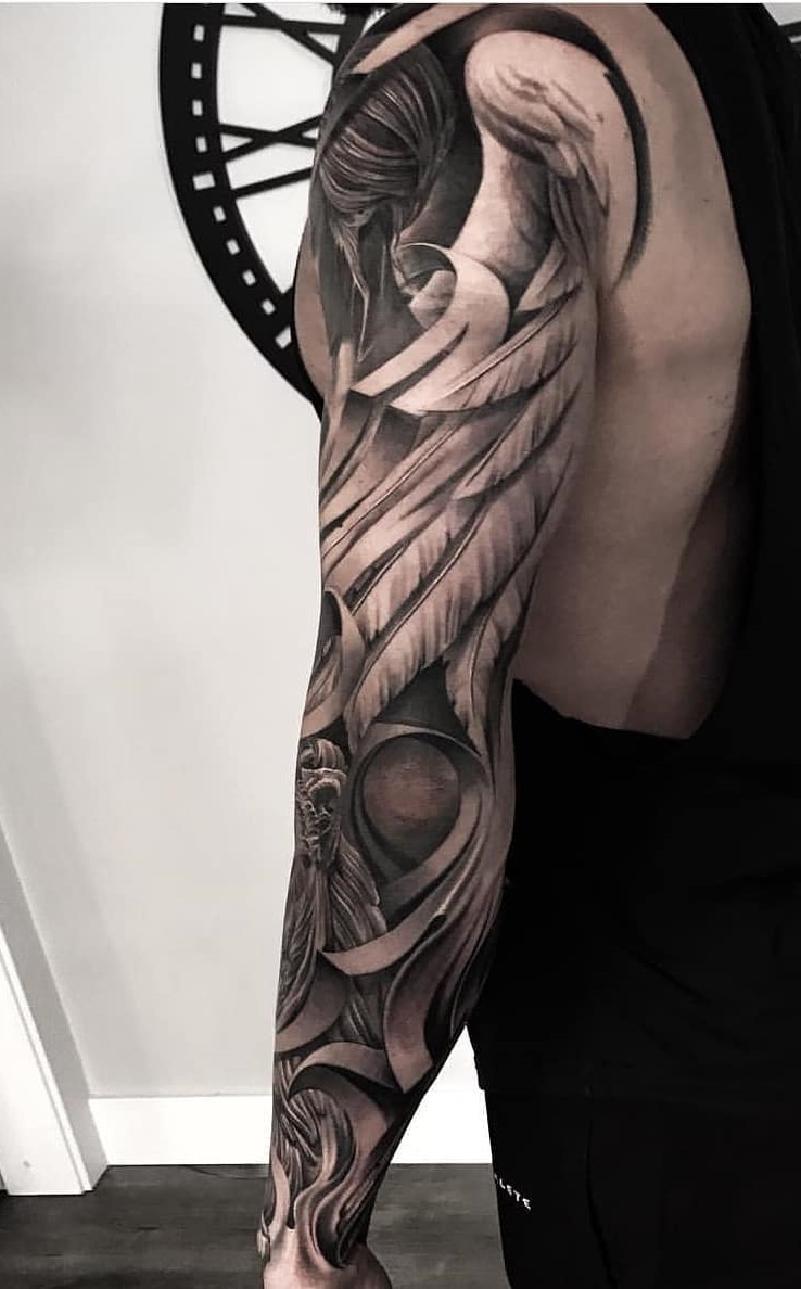 brazo lleno de tatuajes 65