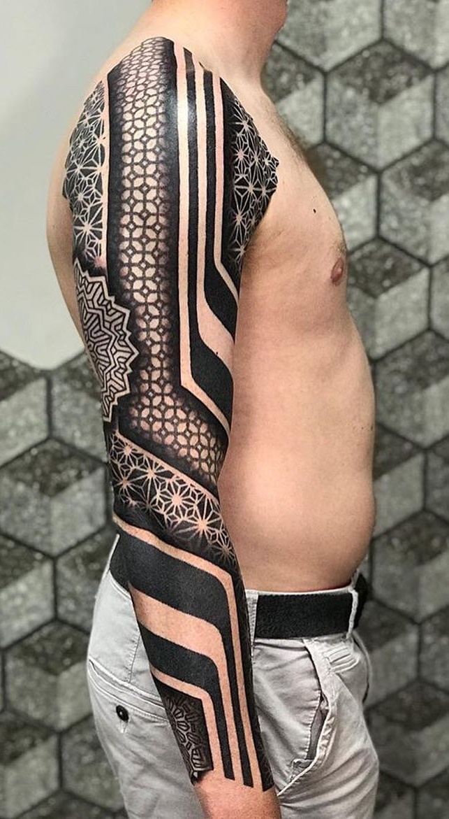 brazo lleno de tatuajes 75