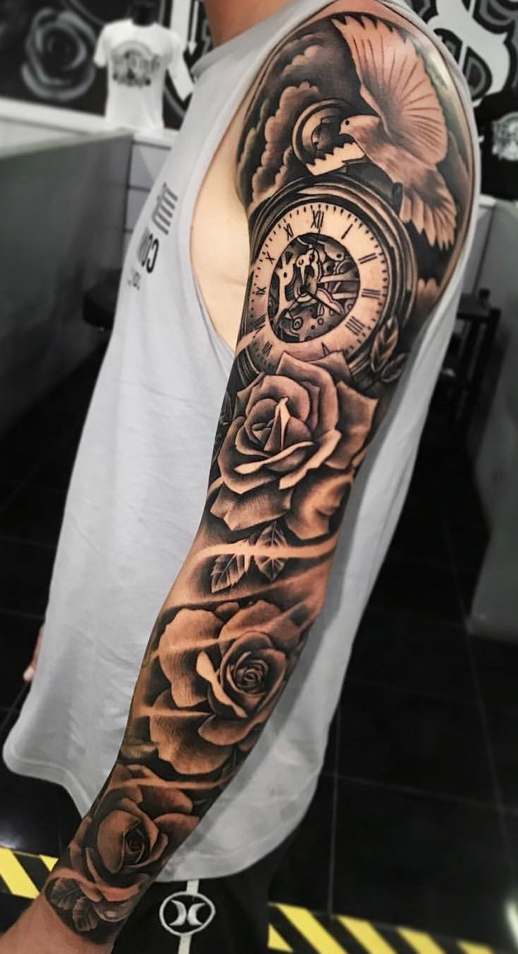 brazo lleno de tatuajes 83