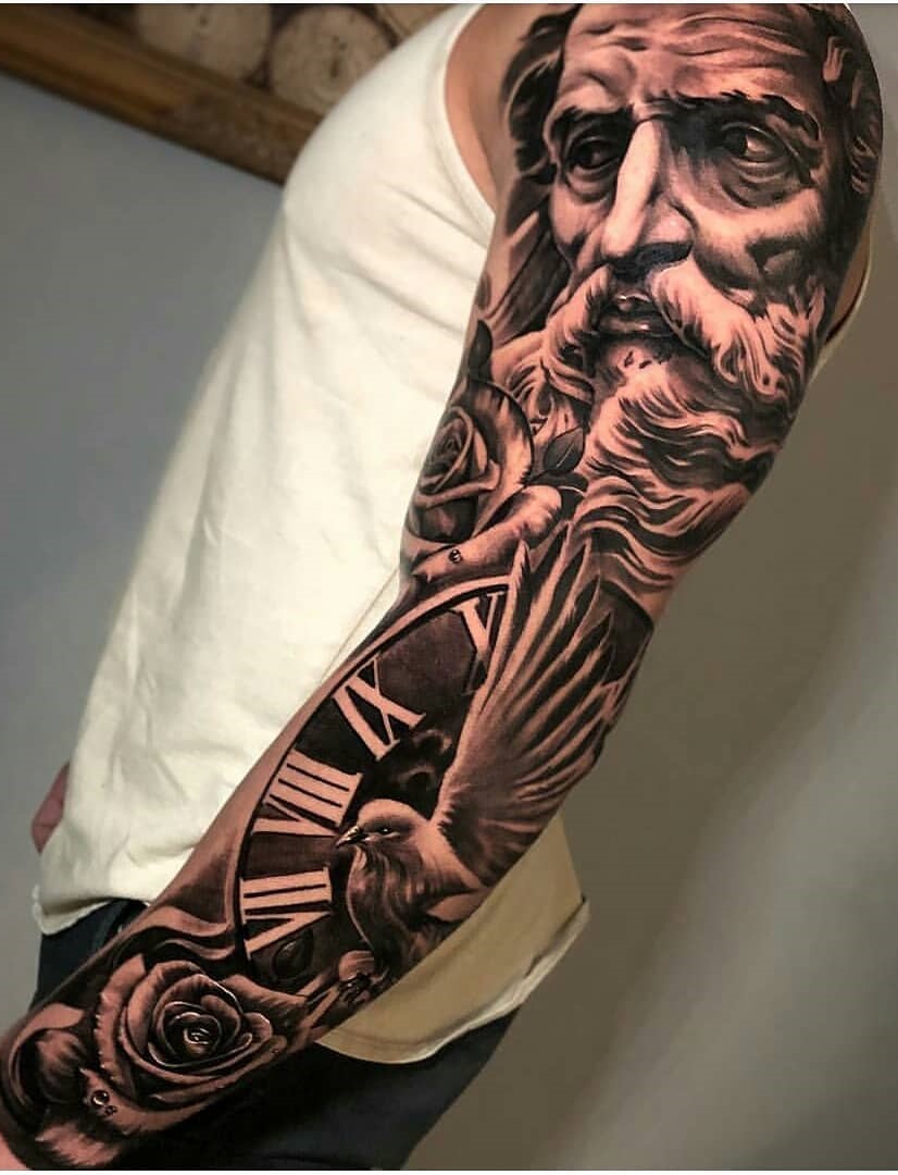 brazo lleno de tatuajes 91