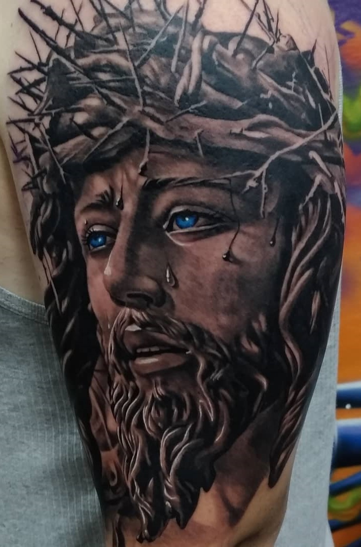 tattoo religioso para hombre 26