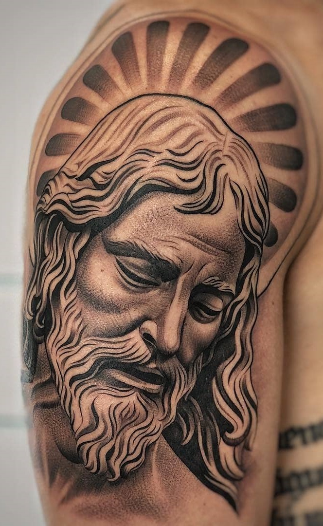 tattoo religioso para hombre 33