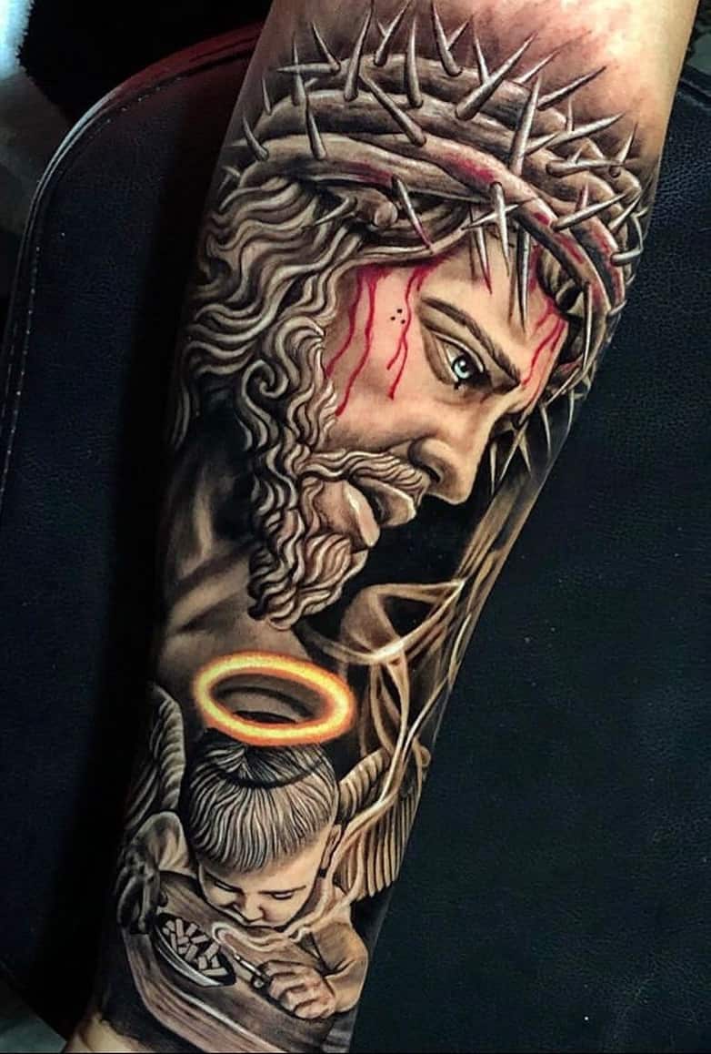 tattoo religioso para hombre 36