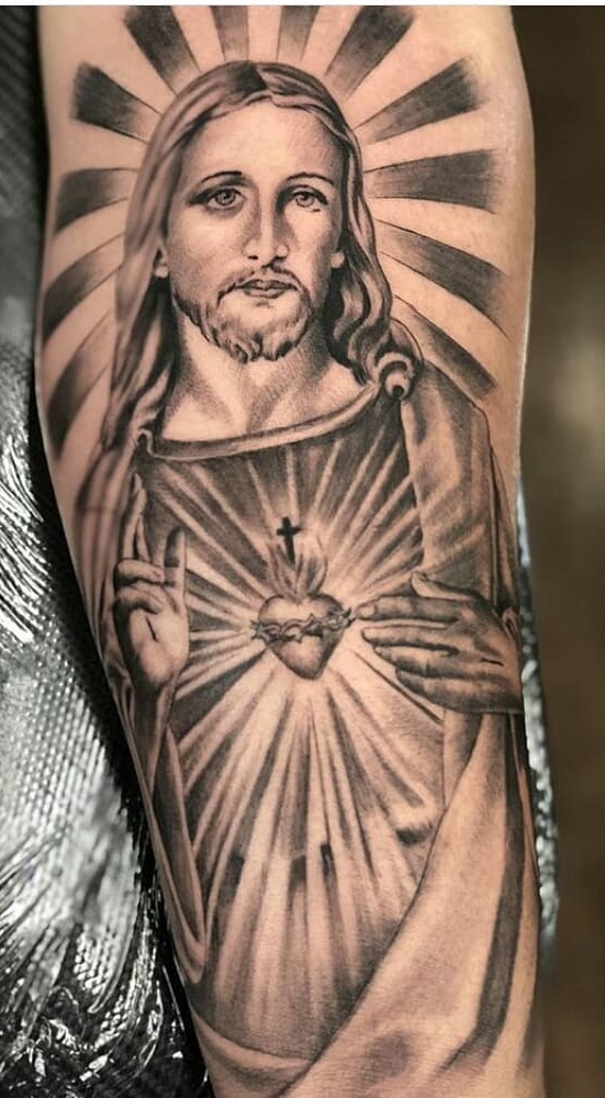 tattoo religioso para hombre 38