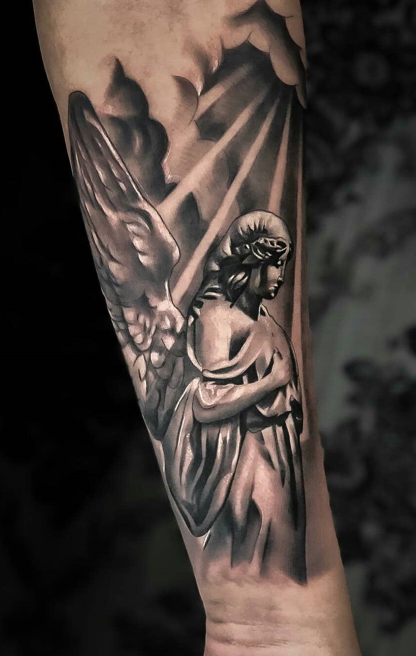 tattoo religioso para hombre 56