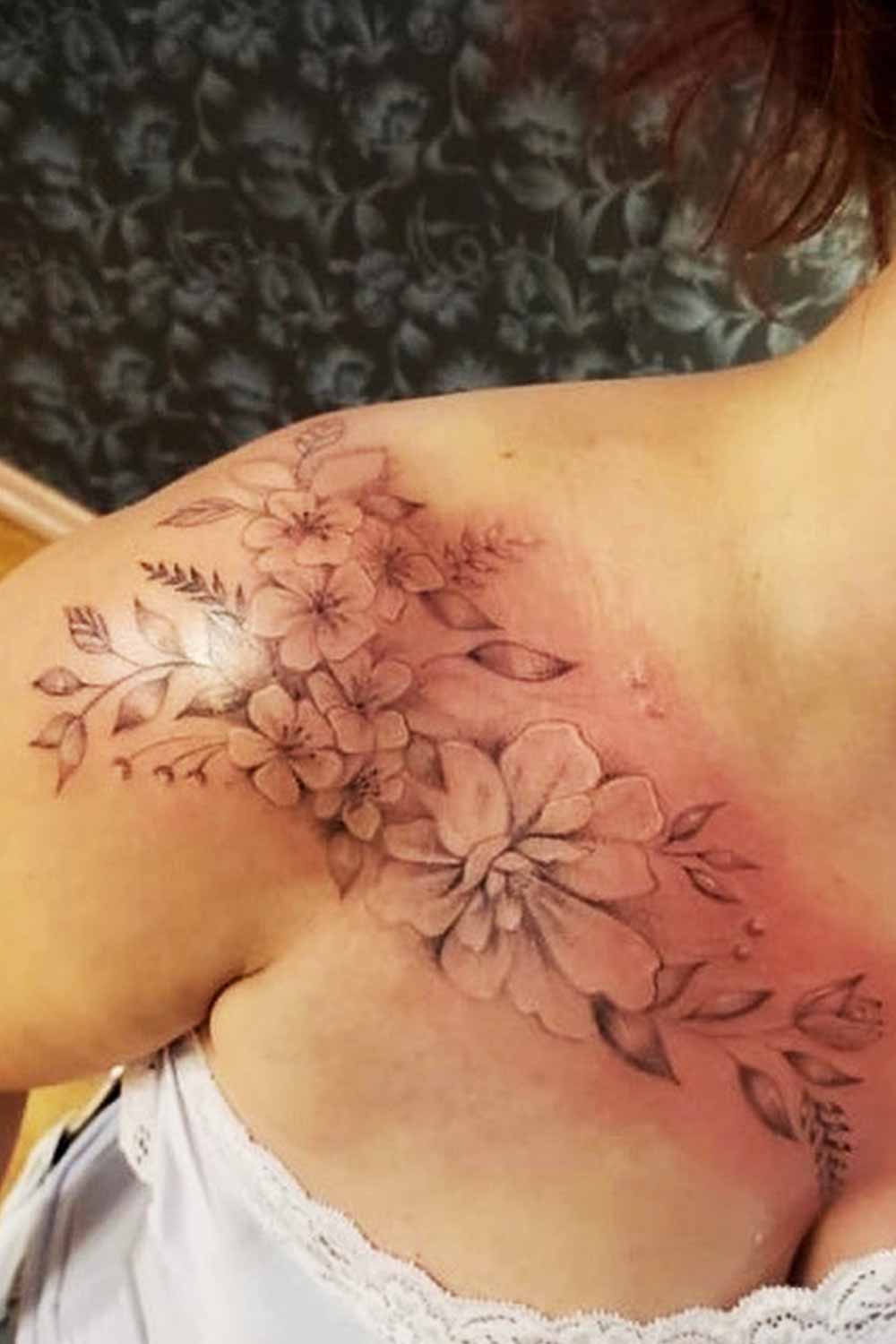 tatuaje de flor en mujer 16