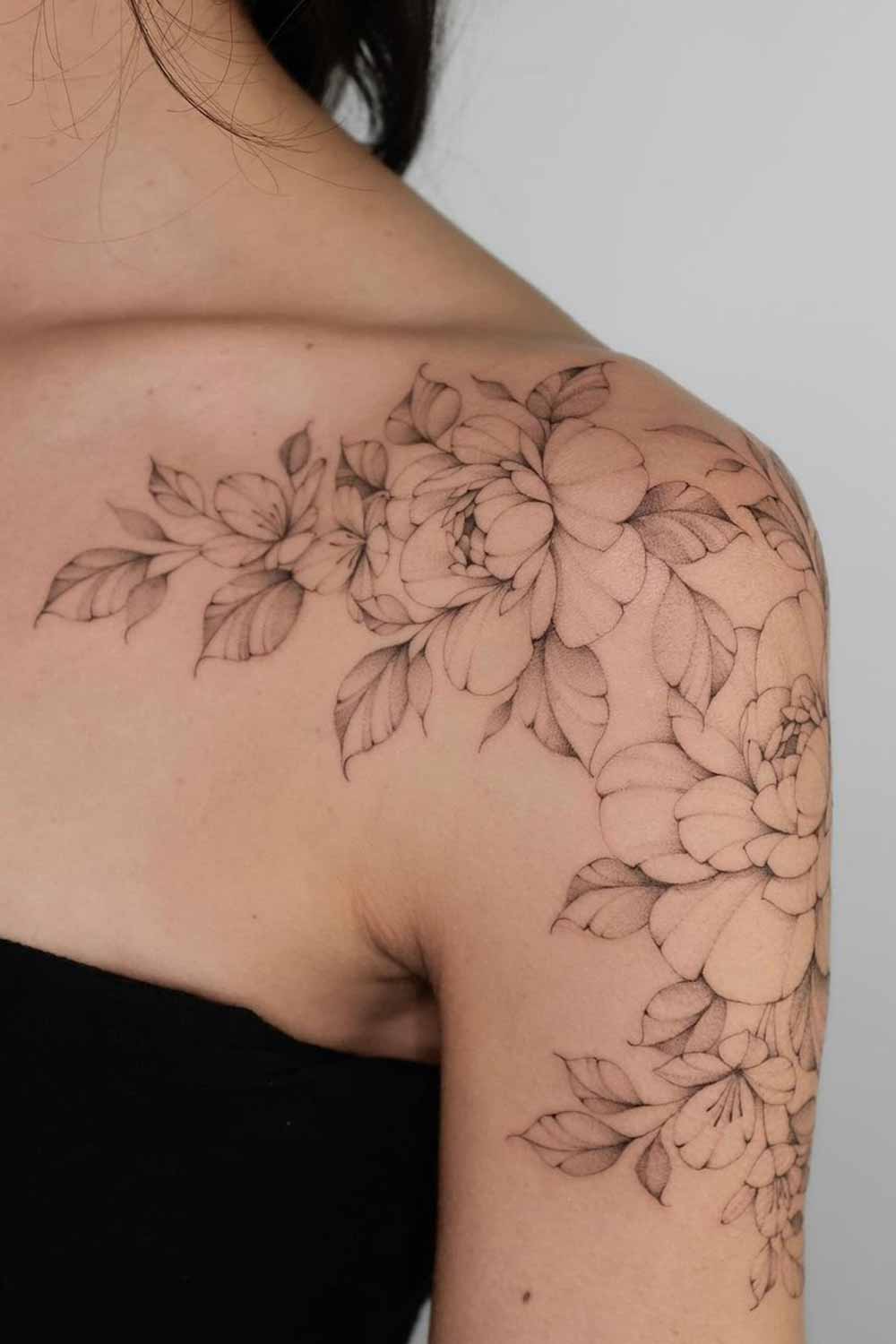 tatuaje de flor en mujer 18