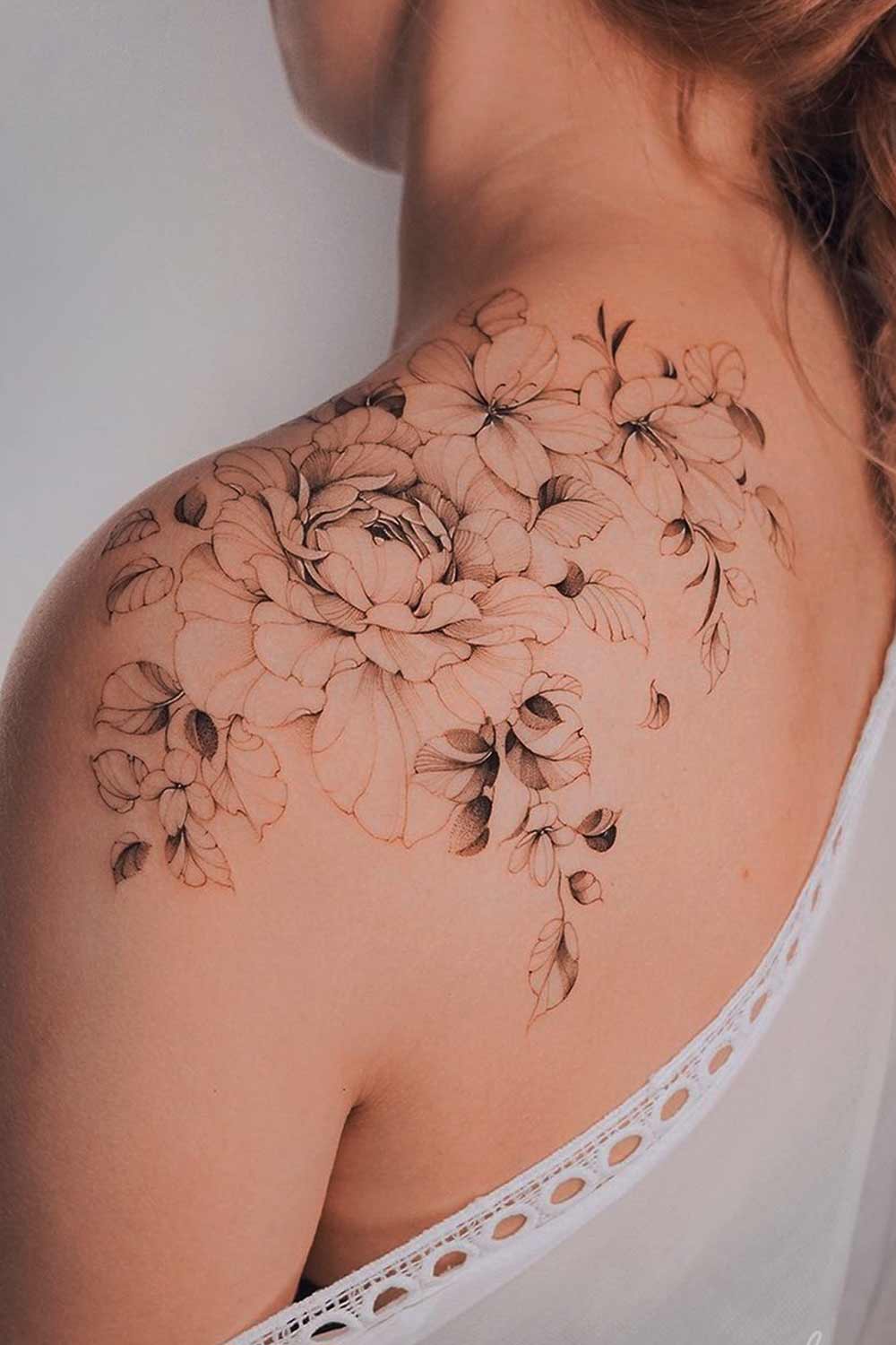 tatuaje de flor en mujer 20