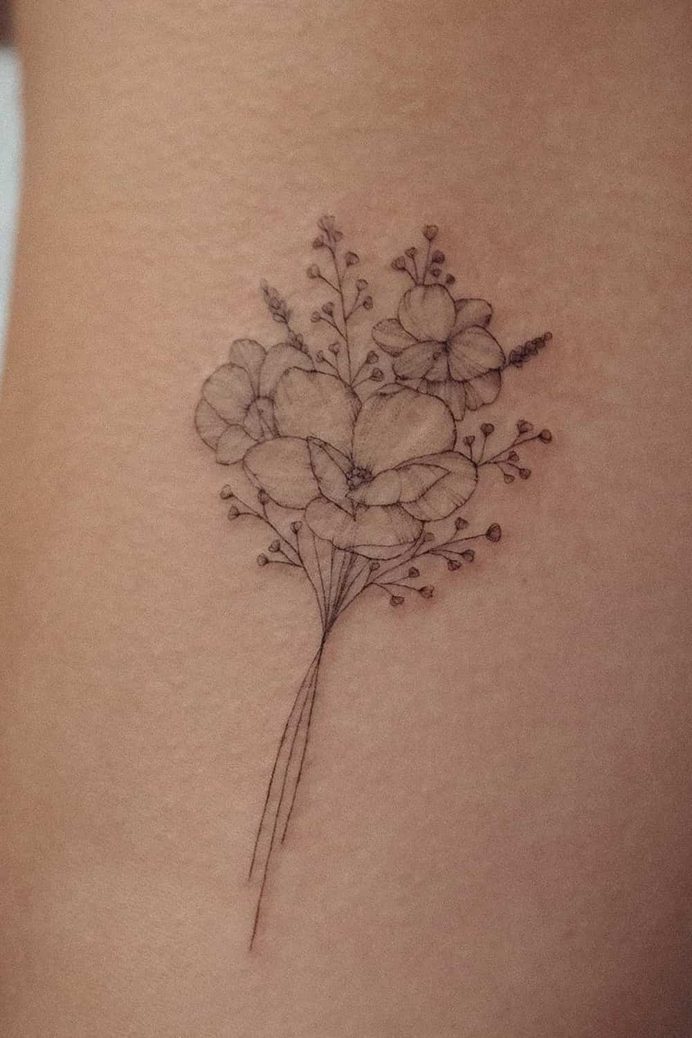 tatuaje de flor en mujer 30